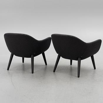 Marcel Wanders, a pair of 'Mad' srmchairs, Poliform, Italy.