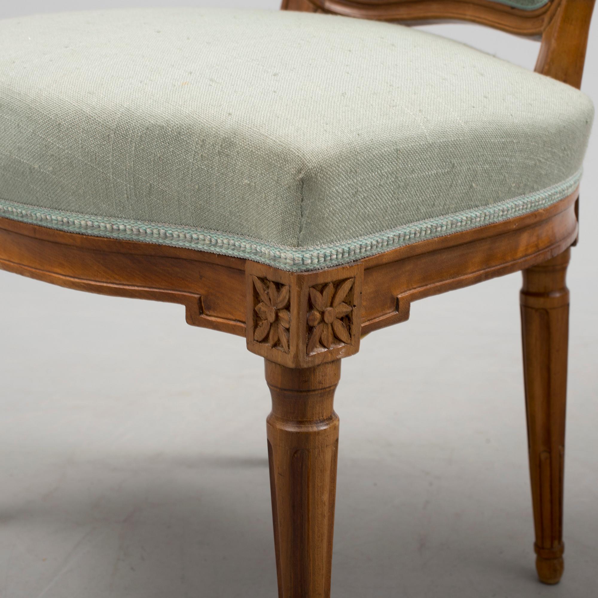 A pair of chairs, circa 1800.