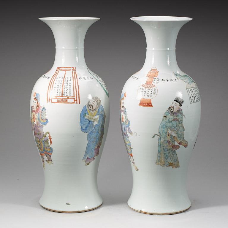 A pair of large Chinese famille rose vases, 20th Century with seal mark in red.