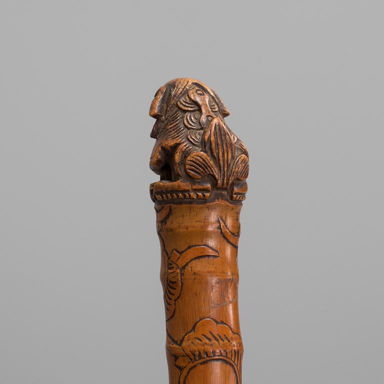 A CHINESE BAMBOO WALKING STICK, latter part of the 19th century.