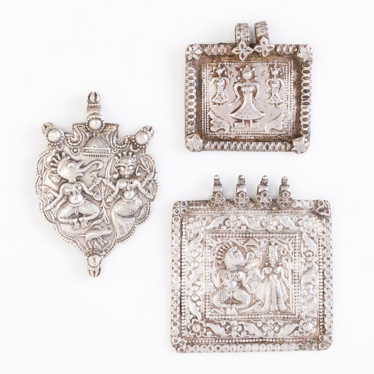 3 PLAQUE-AMULETS, silver, Northern India before 1960's.