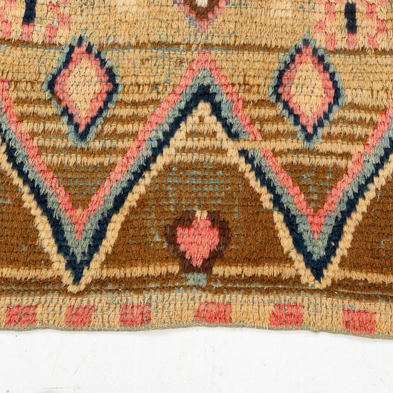 A south western Finish knotted pile bed cover, dated 1800. ca 189 x 123 cm.
