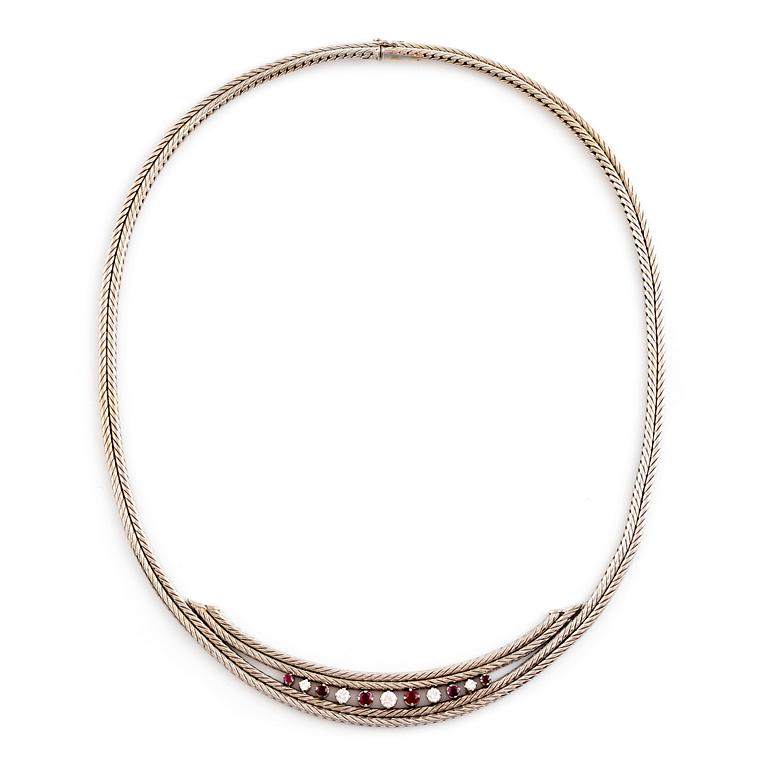 An 18 white gold necklace set with round brilliant-cut diamonds and rubies.