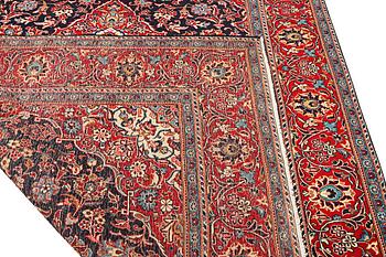A Kashan carpet. a. 300 x 195 cm.