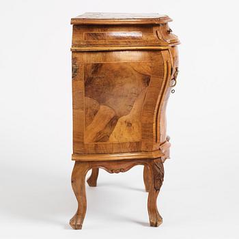 An Italian Louis XV-style bombé commode, later part 19th century.