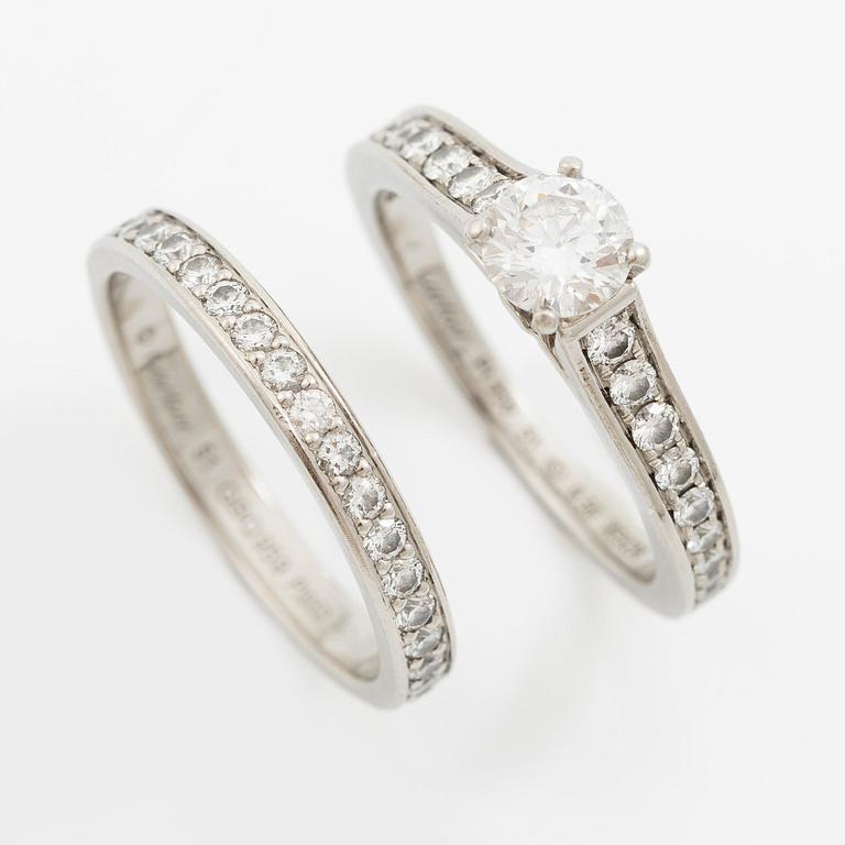 Cartier two rings platinum with round brilliant-cut diamonds.