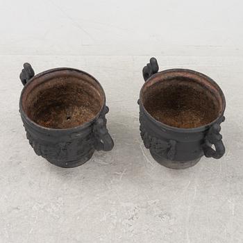 A pair of cast-iron urns from Stafsjö Bruk, 20th Century.