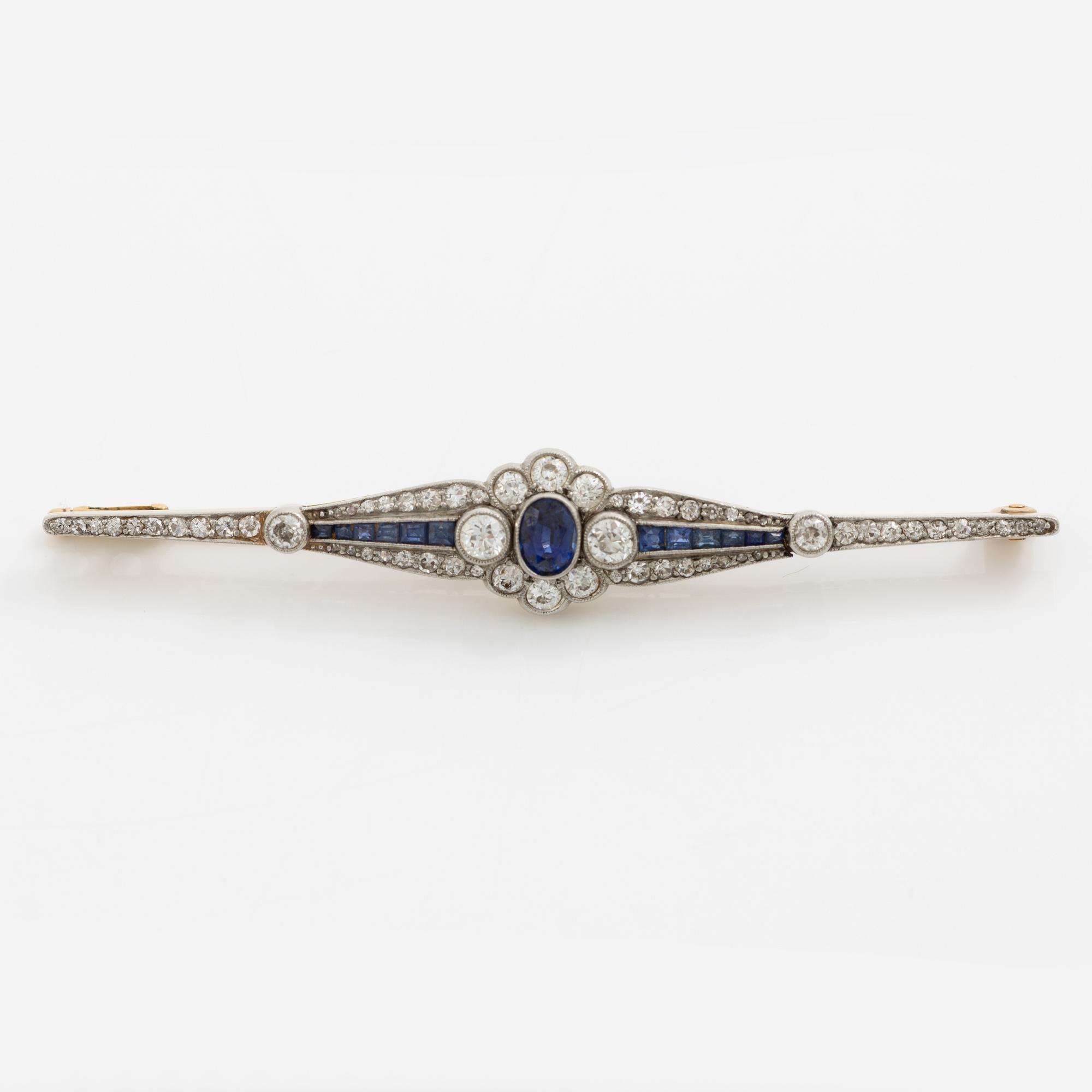 Brooch 18K gold set with octagonal and old-cut diamonds and sapphires.