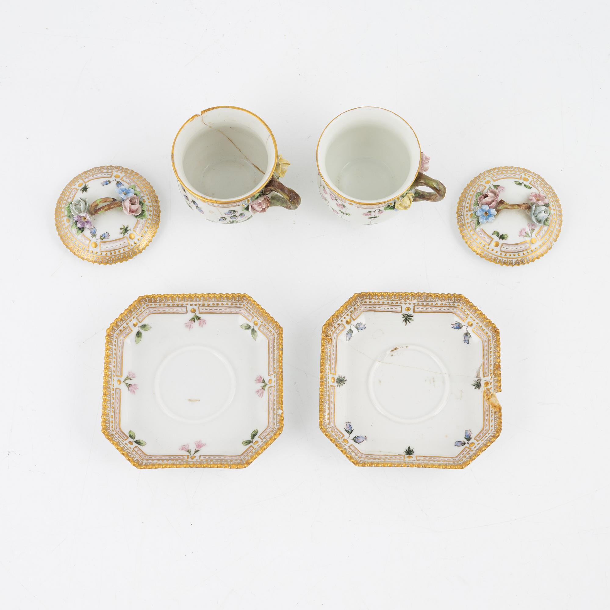 A set of two Royal Copenhagen 'Flora Danica' custard cups with covers and saucers, Denmark, 20th Century.