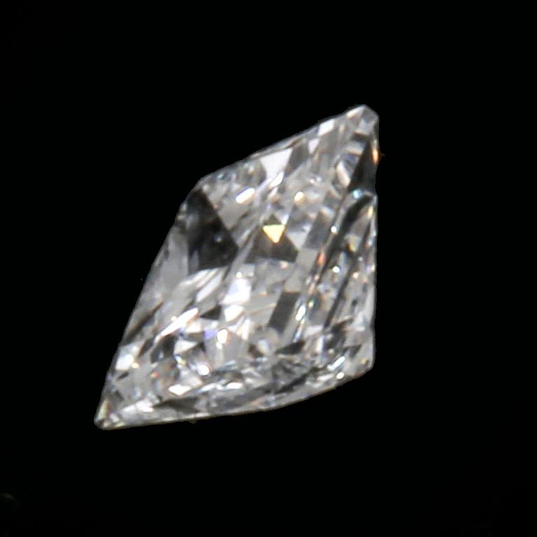 Lös sten prinsesslipad diamant ca 0,30 ct TW/VS enligt uppgift.
