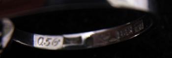 RING, vitguld 18 K med 8+1 diamanter, tot 0,56 ct enl gravyr.