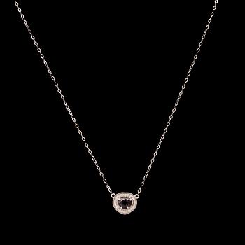 An 18K white gold necklace set with a heart-cut purple sapphire and round brilliant-cut diamonds, Arezzo Italy.