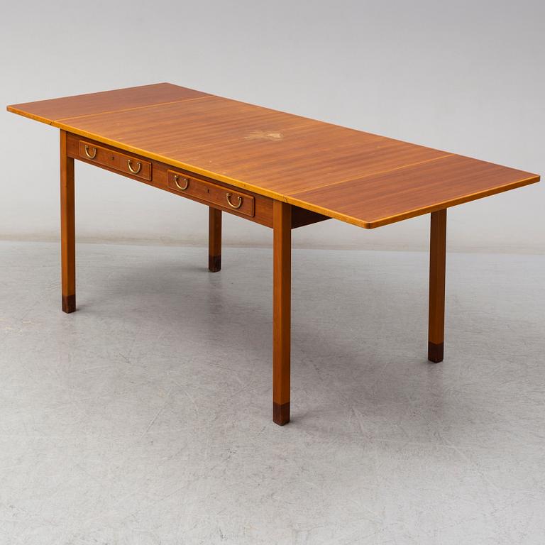 A mid 20th Century writing desk by David Rosén for Nordiska Kompaniet.