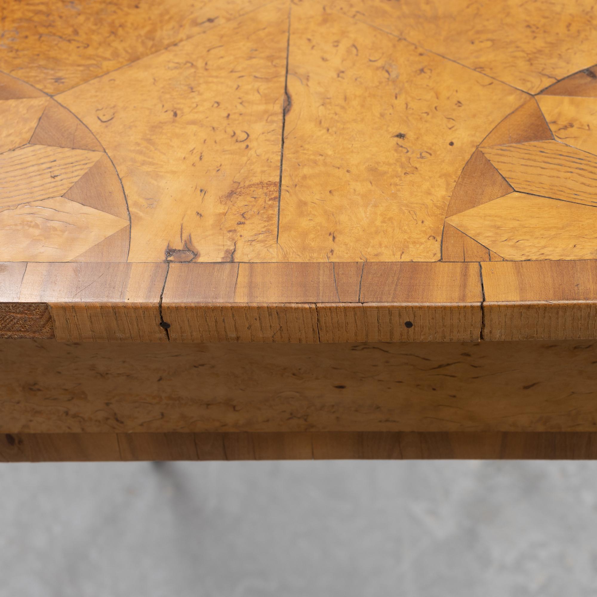 An inlay table, 19th Century.