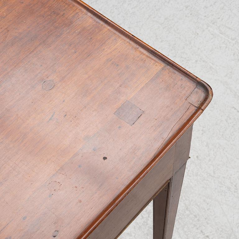 A late gustavian mahogany table, late 18th century.