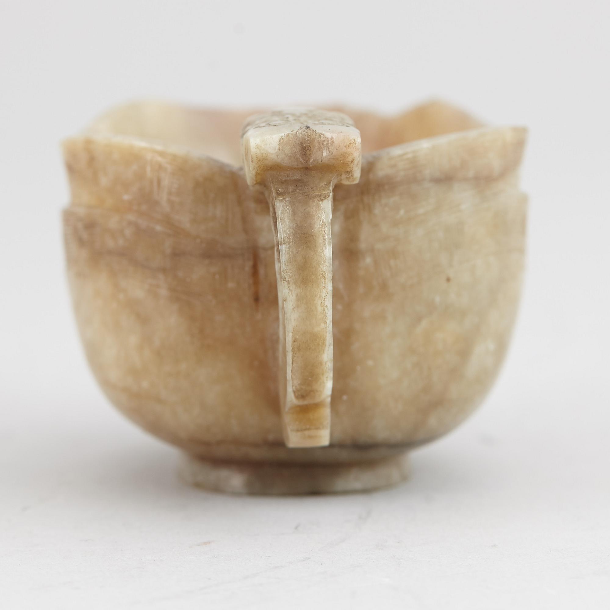 A group of three nephrite objects, Qing dynasty.