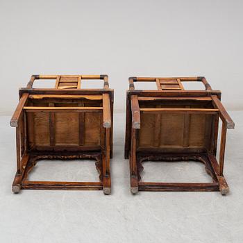 A pair of Chinese wooden armchairs, late 19th/early 20th century.