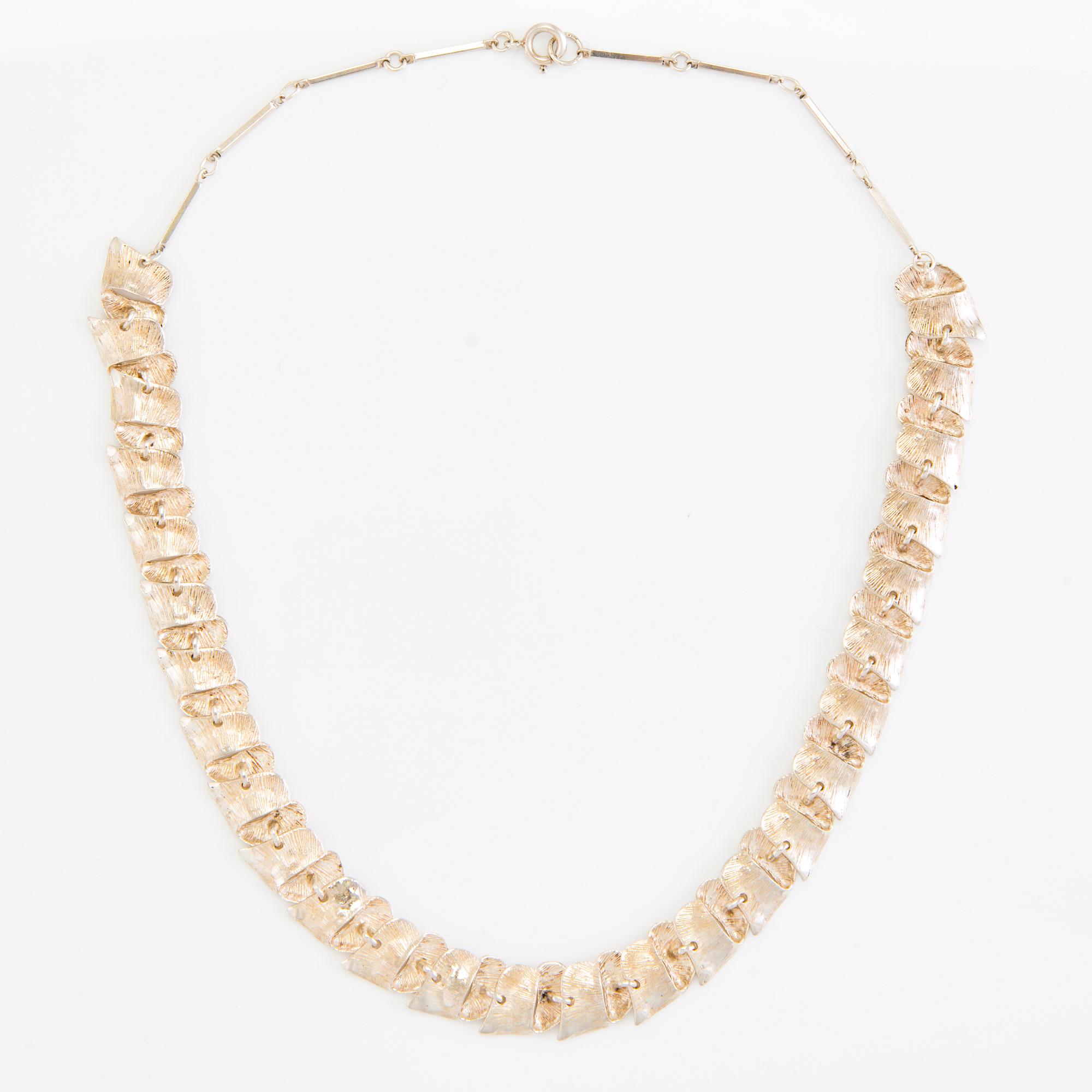 A set of sterling silver necklace and bracelet. Valo-koru, Turku.