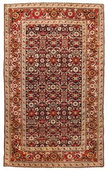 An antique Agra rug, ca 208 x 127 cm.