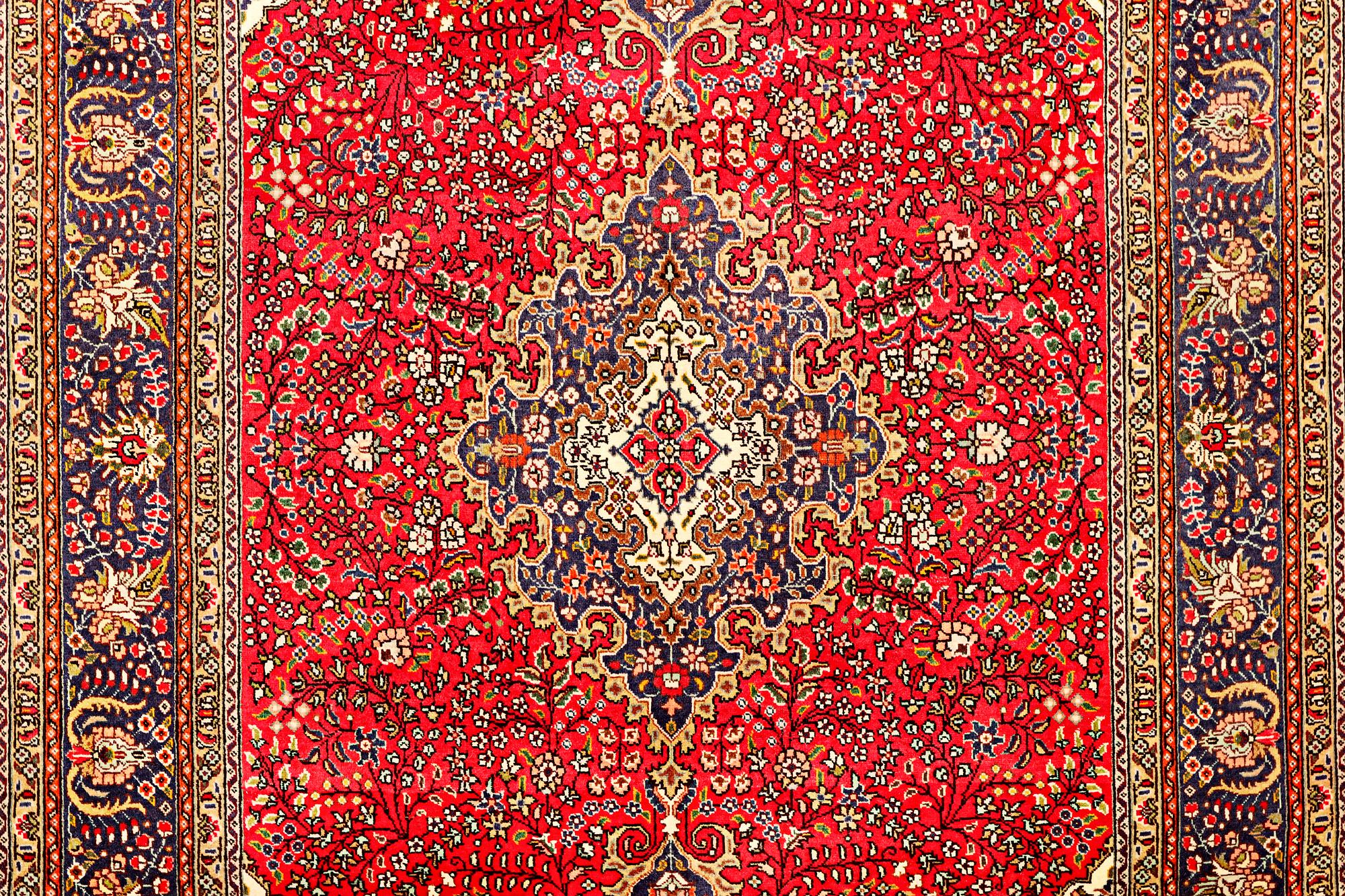 A Tabriz carpet, c 295 x 198 cm.