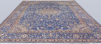 A Kashmar carpet, 408 x 307 cm.