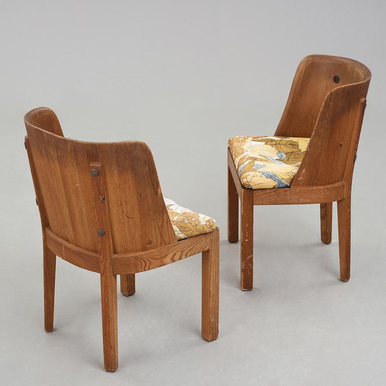 Axel Einar Hjorth, a pair of "Lovö" stained pine armchairs, Nordiska Kompaniet, Sweden 1930's.