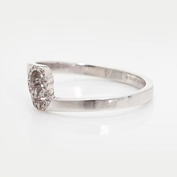Gucci, an 18K white gold 'GG Running' ring with diamonds.