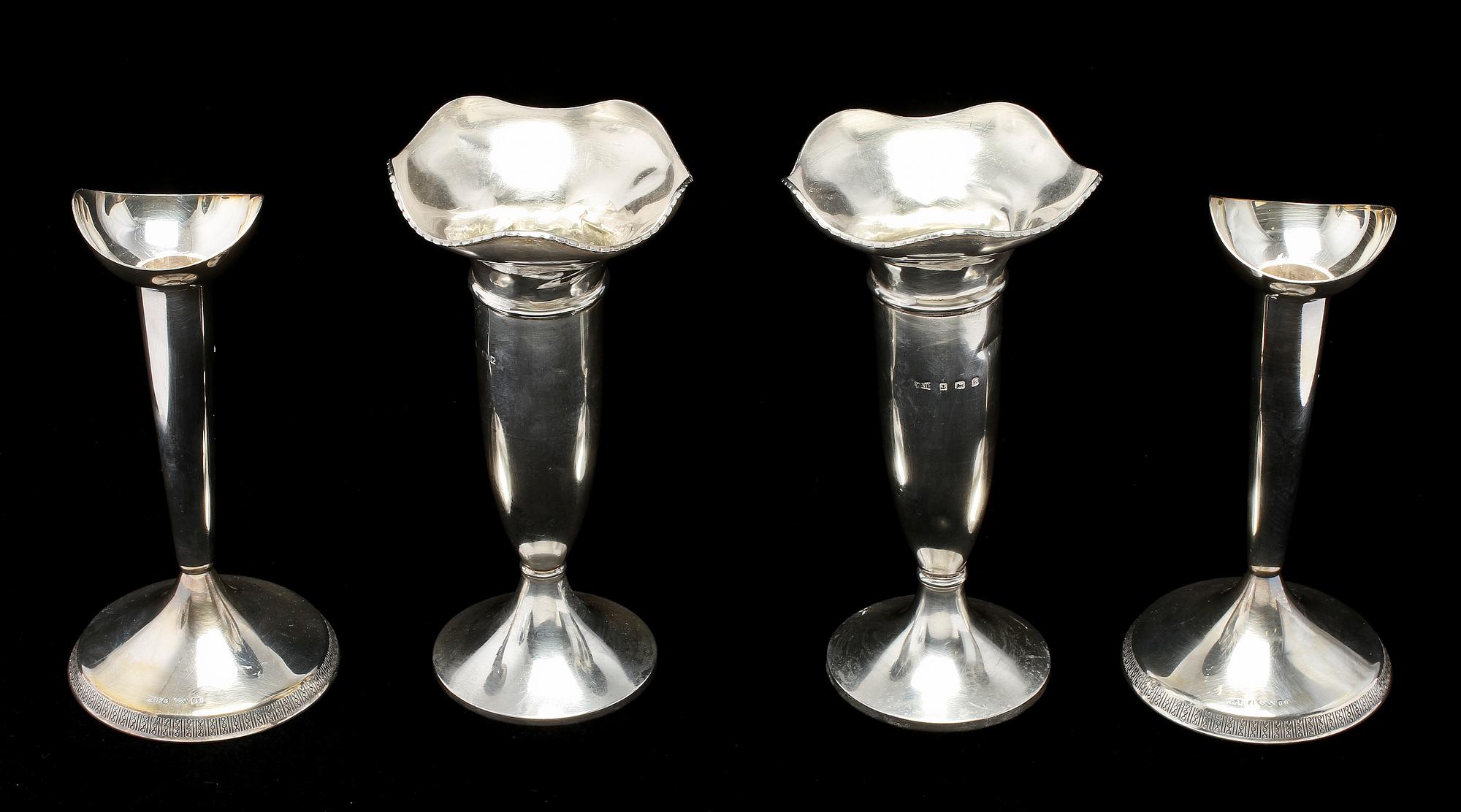 VASER, ett par, samt LJUSSTAKAR, ett par, silver, 1900-tal.
