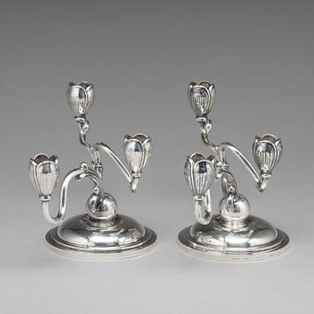 A pair of W.A. Bolin silver candelabra for three lights, Stockholm 1955.