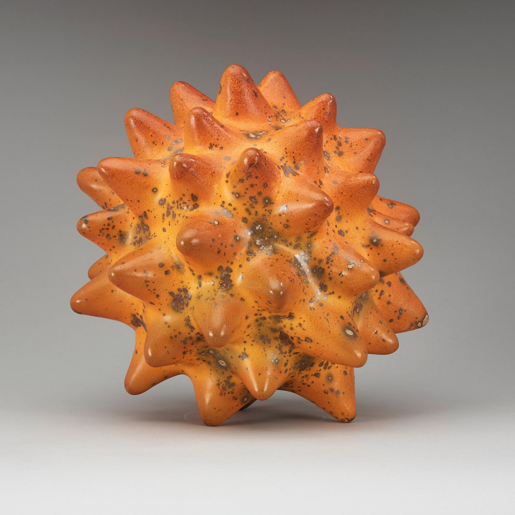 A Hans Hedberg faience sculpture of a sea urchin, Biot, France.