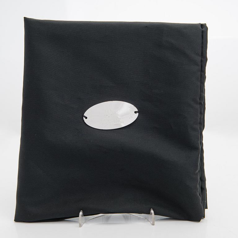 Fendi, a brown leather bag.