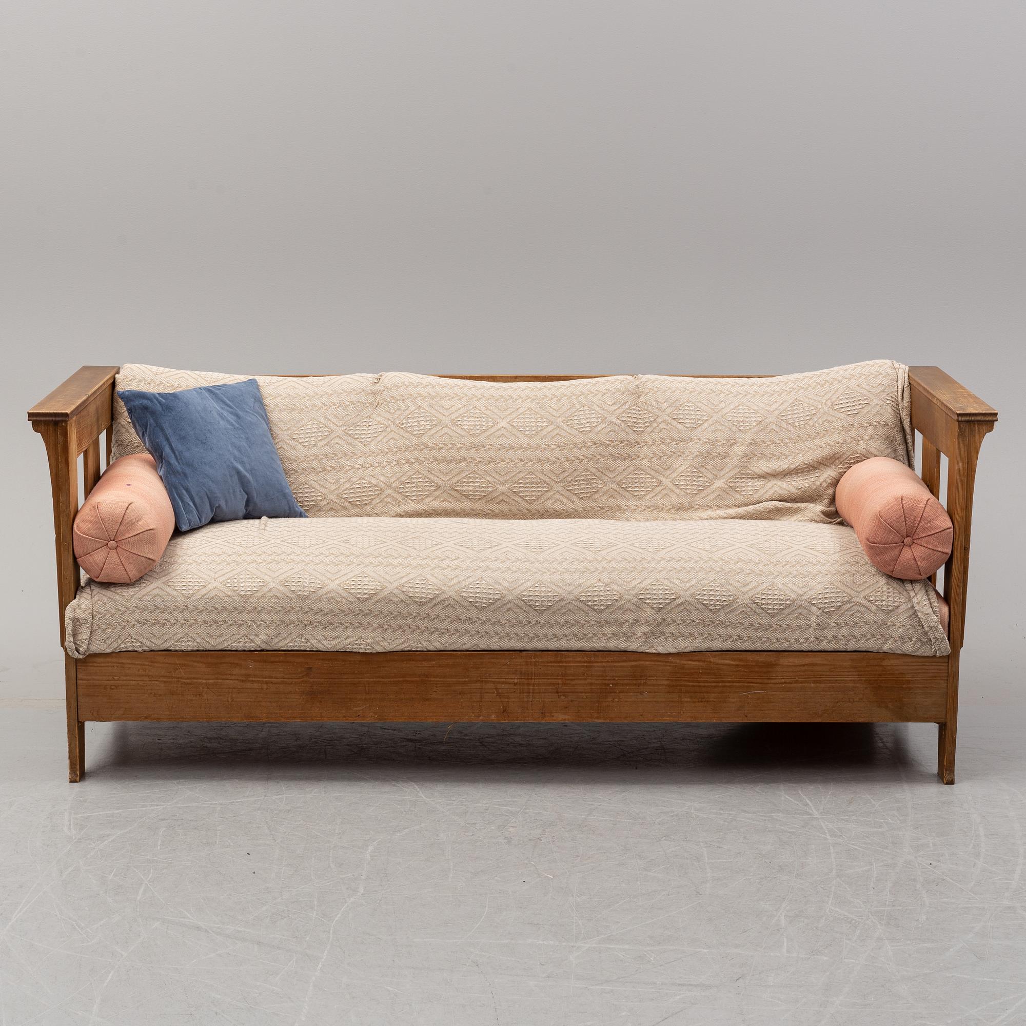 A eary 20th Century pine sofa attributed to Carl Westman.