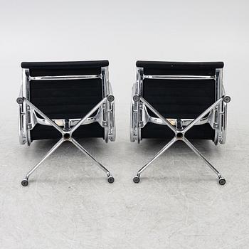 Charles & Ray Eames, A pair of EA 108 armchairs, Vitra.