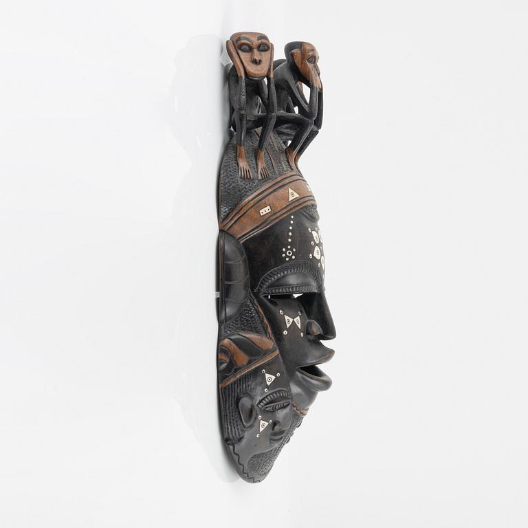 A wooden mask, Gambia, 21st Century.