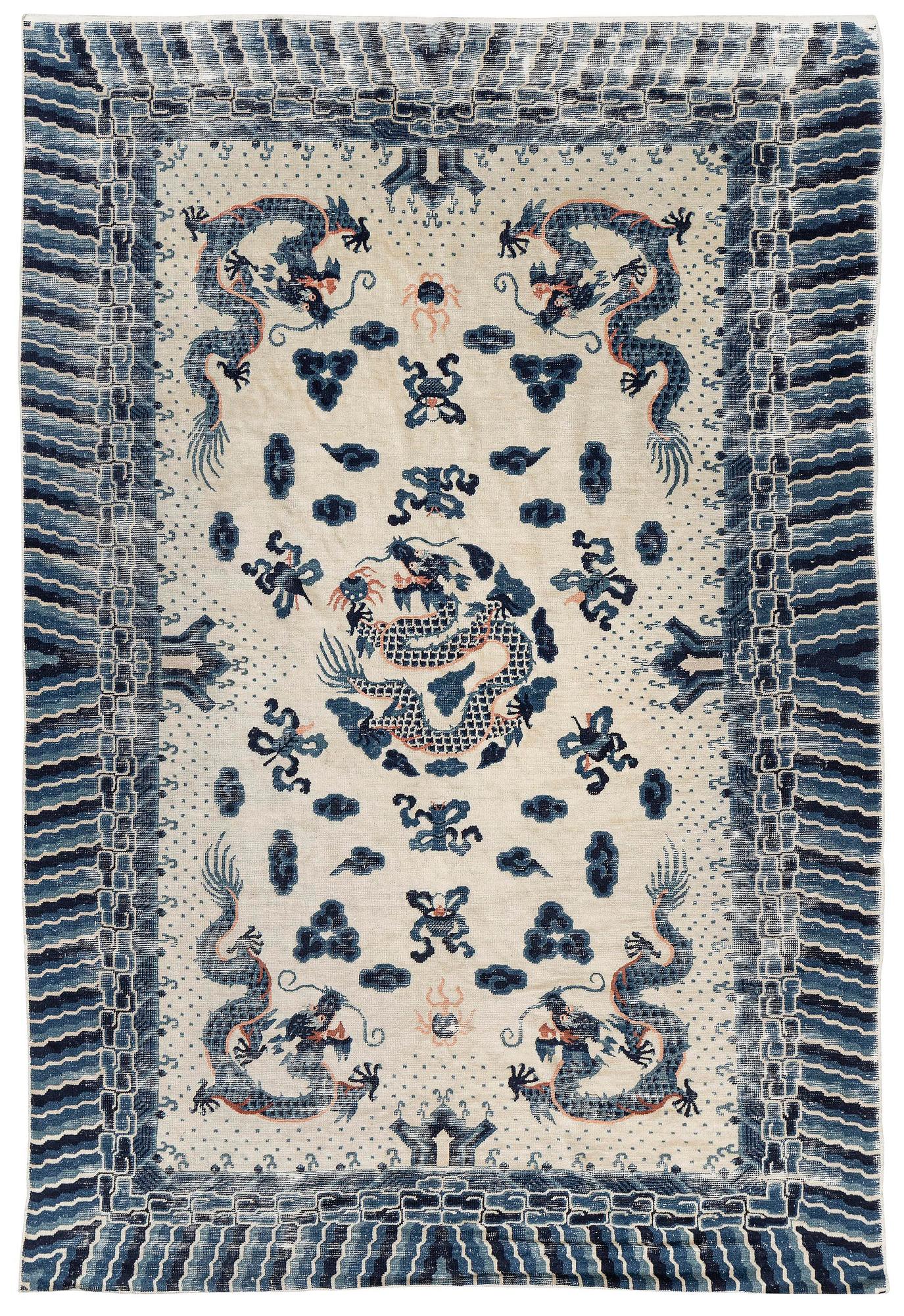 An antique Chinese ' five dragon rug', c. 280 x 190 cm.