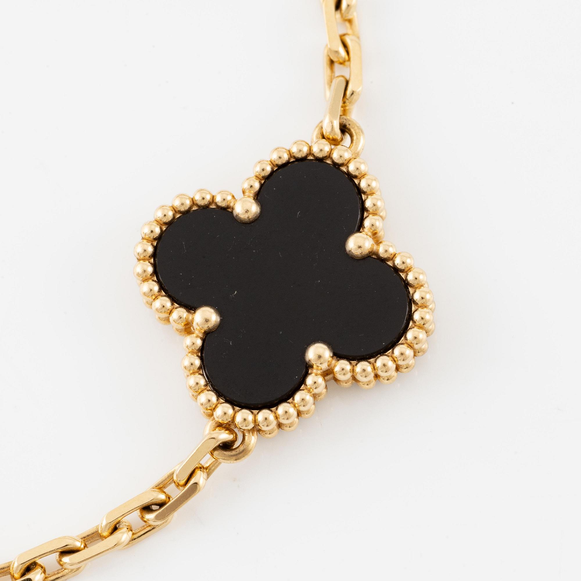 A Van Cleef & Arpels bracelet "Alhambra" 18K gold with onyx.