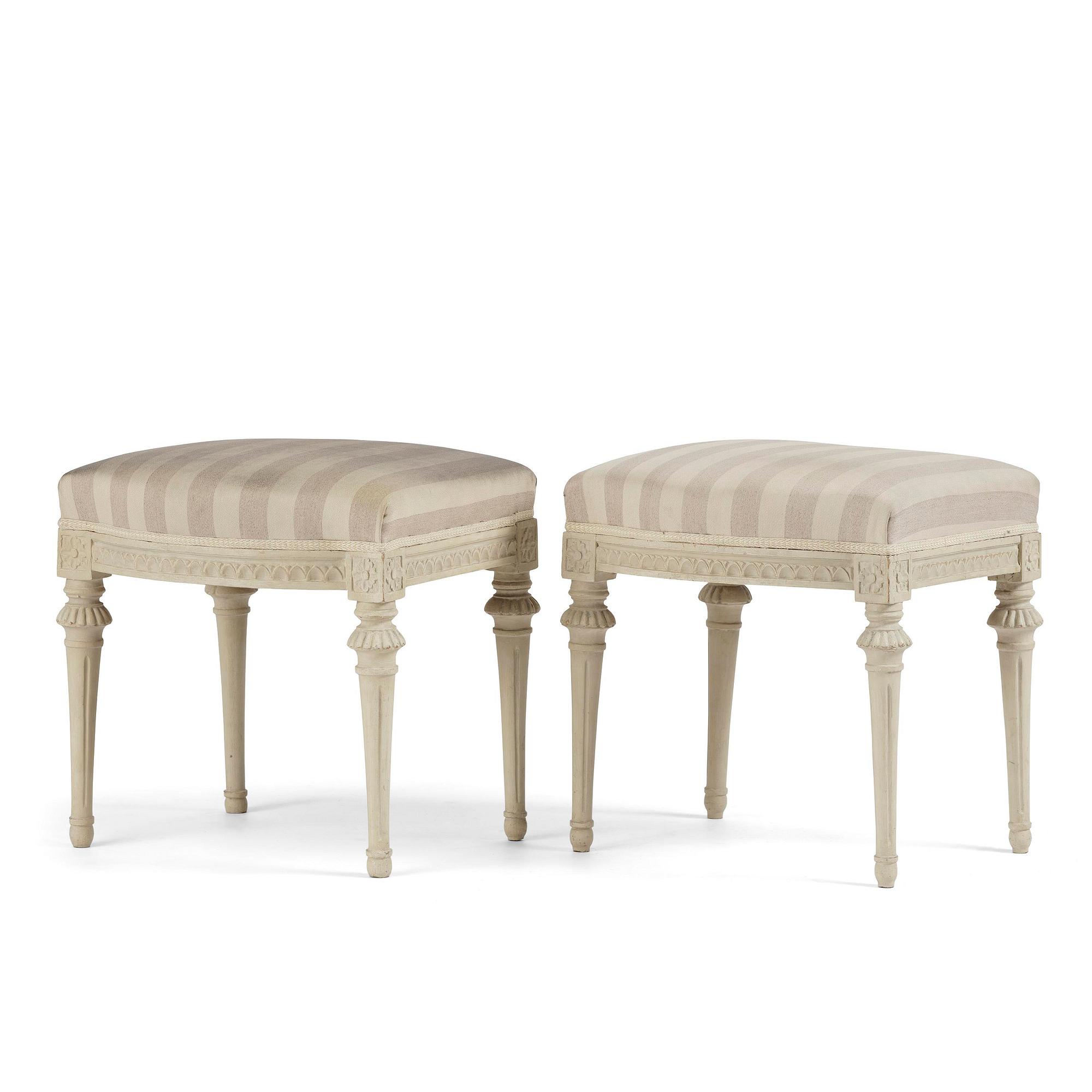 A pair of late Gustavian stools by J. E. Höglander (master in Stockholm 1777-1813).