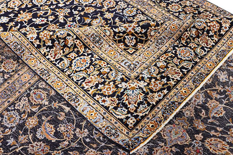 A Kashan carpet, c. 413 x 308 cm.