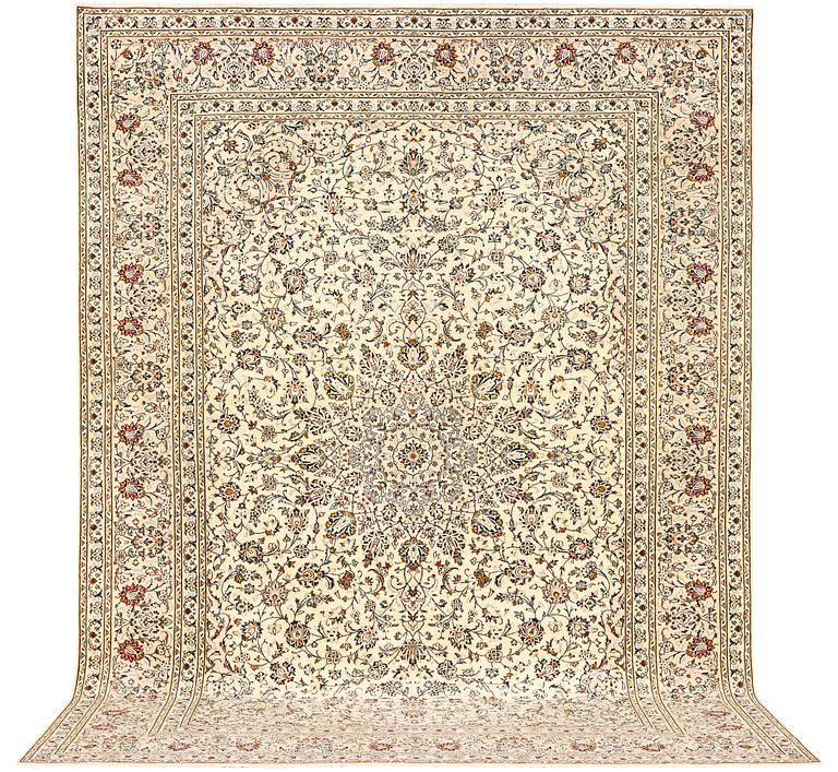 A Kashan carpet, a. 405 x 295 cm.