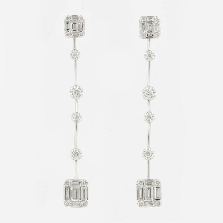 Earrings with baguette and brilliant cut diamonds.