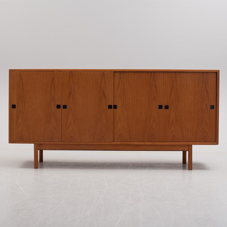 A second half of the 20th century teak veneered sideboard by Central Møbler Bolighus, Denmark.