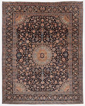 A Keshan rug, approx. 370 x 297 cm.