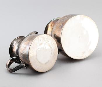KANNOR, 2 st, nysilver, 1900-talets första hälft.