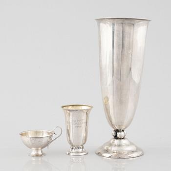 Two silver vases and a punch cup, one by W.A. Bolin, Stockholm 1929.