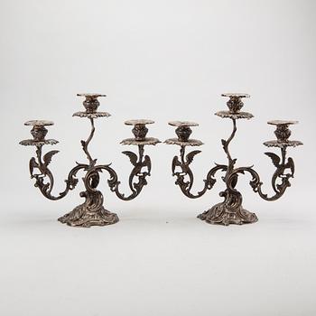 A pair of Swedish silver candelabra mark of GUSTAF MÖLLENBORG Stockholm 1846 , total weight ca 4420 gr, height 31 cm.