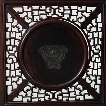 A four panel screen with porcelain placques, Qing dynasty, 19th Century.