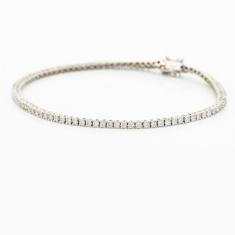 Tennis bracelet 18K white gold with brilliant-cut diamonds.