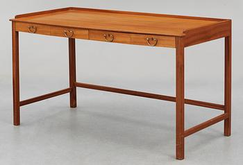 A Josef Frank mahogany desk by Svenskt Tenn.