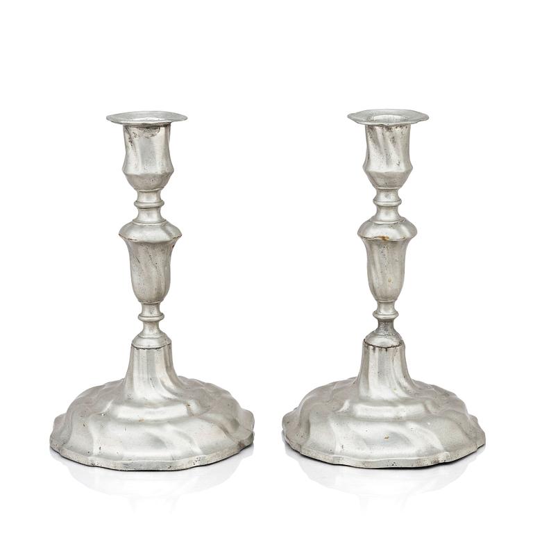 A pair of Rococo pewter candlesticks by C Sauer 1749.