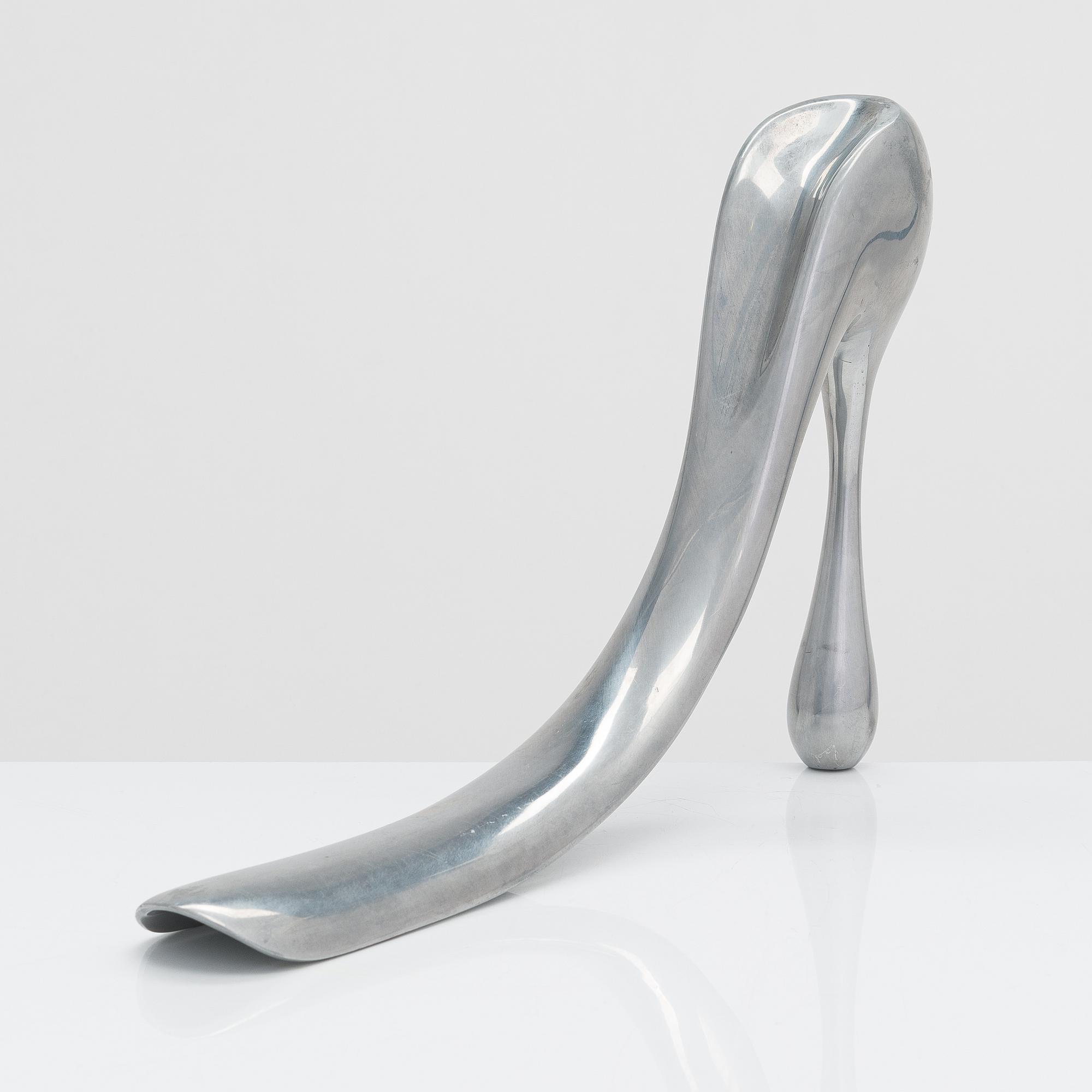 A metal shoe horn by Manolo Blahnik, 2000s.